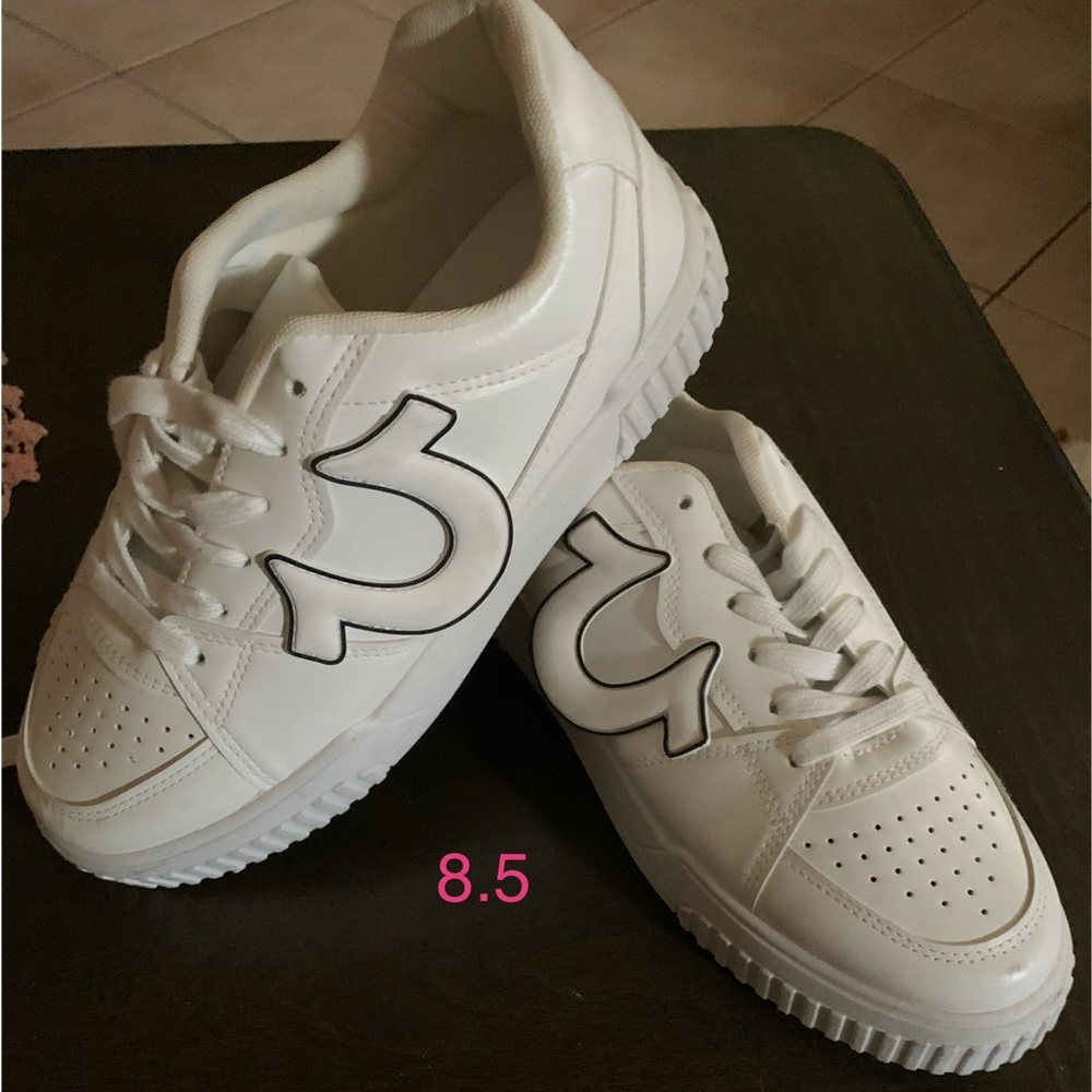 White Sneakers with Black Logo